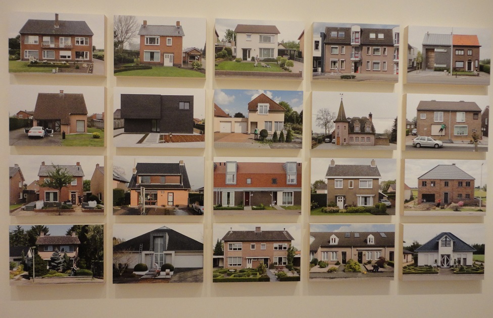 Spot the difference: Belgian and Dutch houses. Top-right is Belgian, two adjoining houses with somewhat differing styles Photos by Hans van der Meer, temporary exhibition in the Riksmuseum, Amsterdam