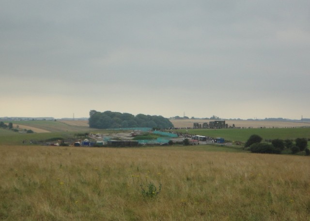 Atmospheric: Stonehenge from nearby fields. The old visitor centre, in front and to the left of the stones, is currently being demolished
